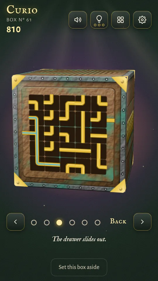 A bronze box with a pipes lock: turn the brass pieces until a line of water runs from the inlet to the outlet